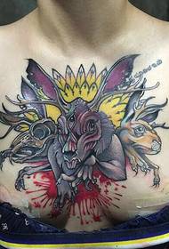 női mellkas alternatív színű totem tetoválás képe