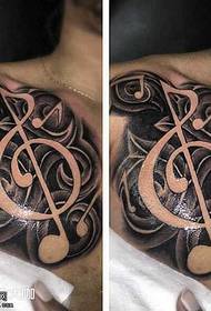 padrão de tatuagem de música relacionada ao peito