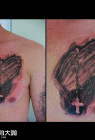chest cross hand tattoo pattern