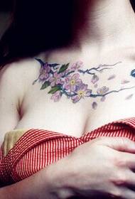 Big breasts beautiful chest beautiful flower bird tattoo picture