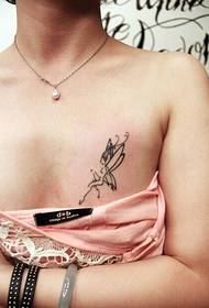 dekle prsi trend majhen elf tattoo vzorec slika