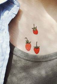 Beautiful cartoon fruit on the chest of the beautiful woman