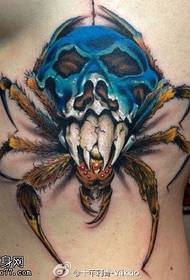 disegno del tatuaggio del petto scarabeo teschio viso