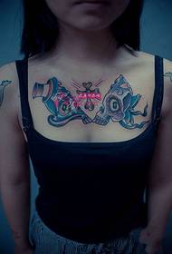 girl chest skull cross tattoo picture
