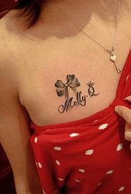 female chest bow letter tattoo pattern picture