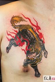 handsome male chest fire unicorn tattoo