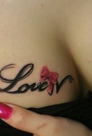 cute bow tattoo picture on the chest