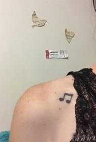 note tattoo girl rame crna Musical note tattoo picture