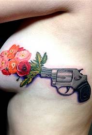 seksīgs modes skaistums krūtīs skaists pistoles ziedu tetovējums bildes attēls