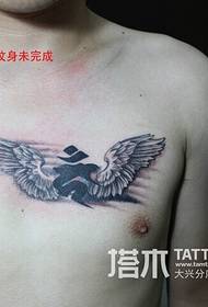 krūšu spārni Sanskrita vāka tetovējums nav pabeigts