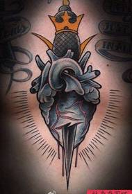 male front chest piercing heart dagger tattoo manuscript