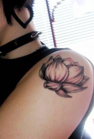 spalle femminile bello mudellu di tatuaggi di lotus neru è biancu