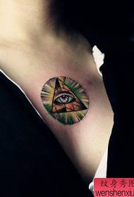 girls chest a god eye tattoo pattern