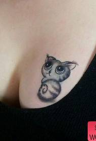 chest tattoo pattern: Chest small raccoon tattoo pattern