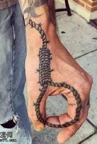 Mfano wa tattoo ya kamba mkononi