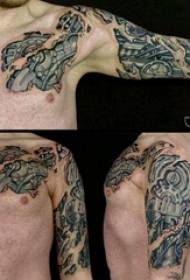 3D slika z lomljenimi usnjenimi mehanskimi tetovažami 3D slika s slomljenim usnjem mehanske tetovaže na roki fanta