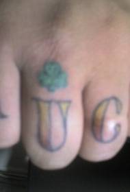Alfabeto inglés Knuckle con pequeno patrón de tatuaxe de trevo