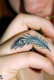 Finger feather tattoo maitiro