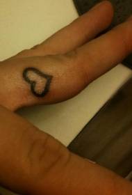 Padrão de tatuagem de símbolo pequeno coração no dedo