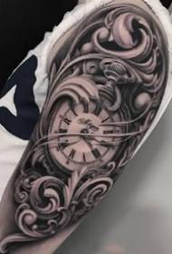 a set of black gray clocks on the arm