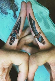Doigt mode belle image de tatouage de poignard image