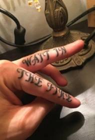 Flower body English tattoo Male student finger flower body English tattoo picture