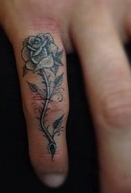 Tatuaggio rosa grigio grigio dito dito coda