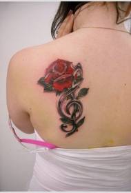 naisen olkapää väri ruusu ja musiikki tatuointi malli