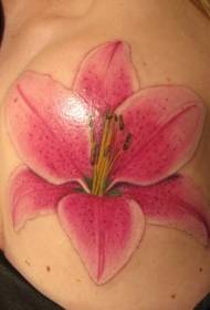 female shoulder lily tattoo pattern