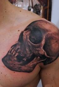 patrón de tatuaje de cráneo marrón negro de hombro masculino