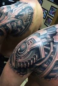 Foto futura del tatuaggio meccanico sulla spalla maschile