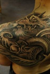 Splendido modello di tatuaggio drago nero grande stile asiatico sulla spalla