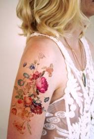 Kvinnliga axlar färg olika blommig tatuering mönster