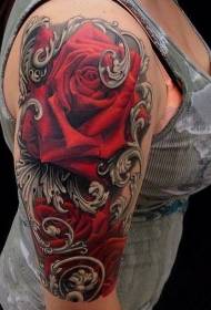 naisen olkapää punainen iso ruusu tatuointi malli