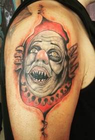 Рука старой школы цветной кожи порвана с рисунком татуировки клоуна дьявола