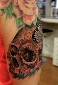 Mexikói stílusú koponya pillangó tetoválás mintával