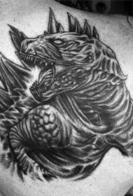 肩に邪悪な黒ゴジラのタトゥー