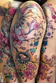Grote arm realistische kleurrijke kolibrie bloem tattoo patroon