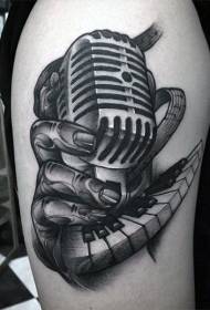 Big arm old school black microphone na may piano key tattoo pattern