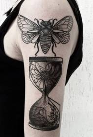 Bras, style abeille noire avec motif de tatouage de fleur de sablier