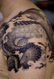 Shoulder traditional black dragon tail tattoo pattern