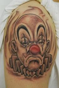 Кловнова тетоважа са црвеним носом на рамену