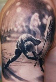 Črno-beli glasbenik portret velika roka tatoo