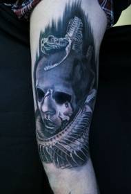 手臂令人毛骨悚然的多彩怪物小丑蛇骨架紋身圖案