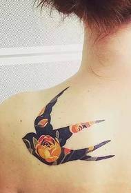 Naughty little swallow tattoo