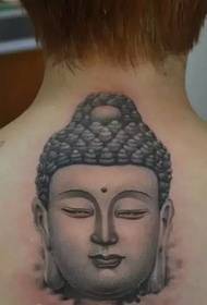 Крутая татуировка на спине Будды