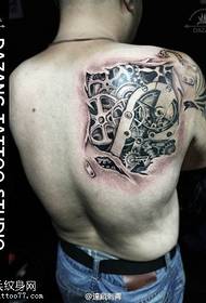 Mechanisch tattoo-patroon op de schouder