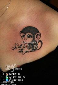 Kleng Monkey Tattoo Muster op der Schëller