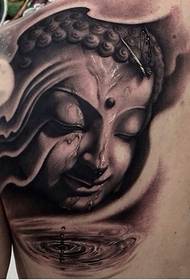 Boeddha kop tattoo op die skouer