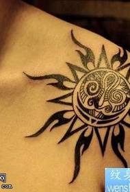Totem sun tattoo pattern on the shoulder